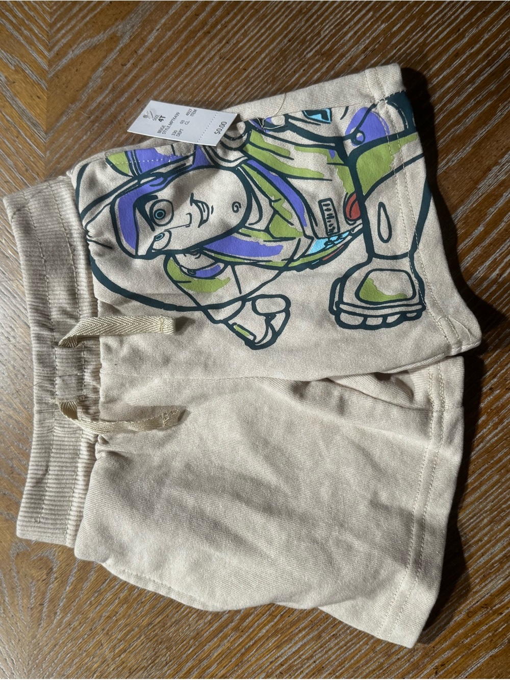 Disney Cream Shorts with Buzz Lightyear Graphic
